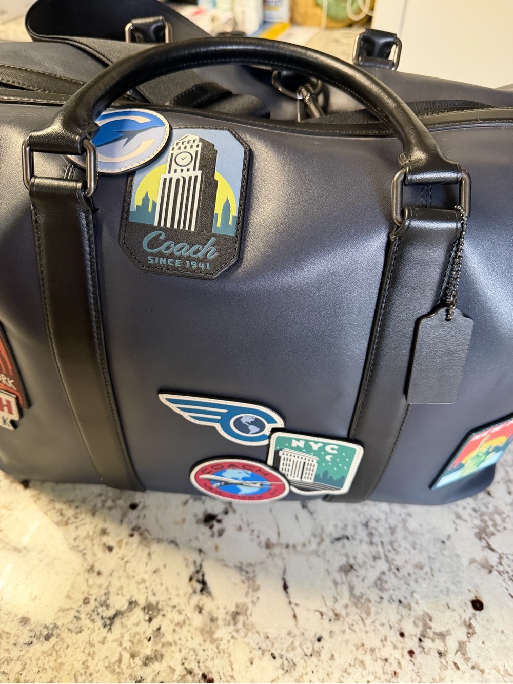 Coach Navy Leather Duffel with Colorful Travel Patch Accents - Picture 8 of 12